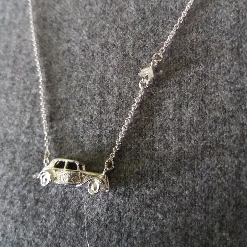 Car necklace with chevron