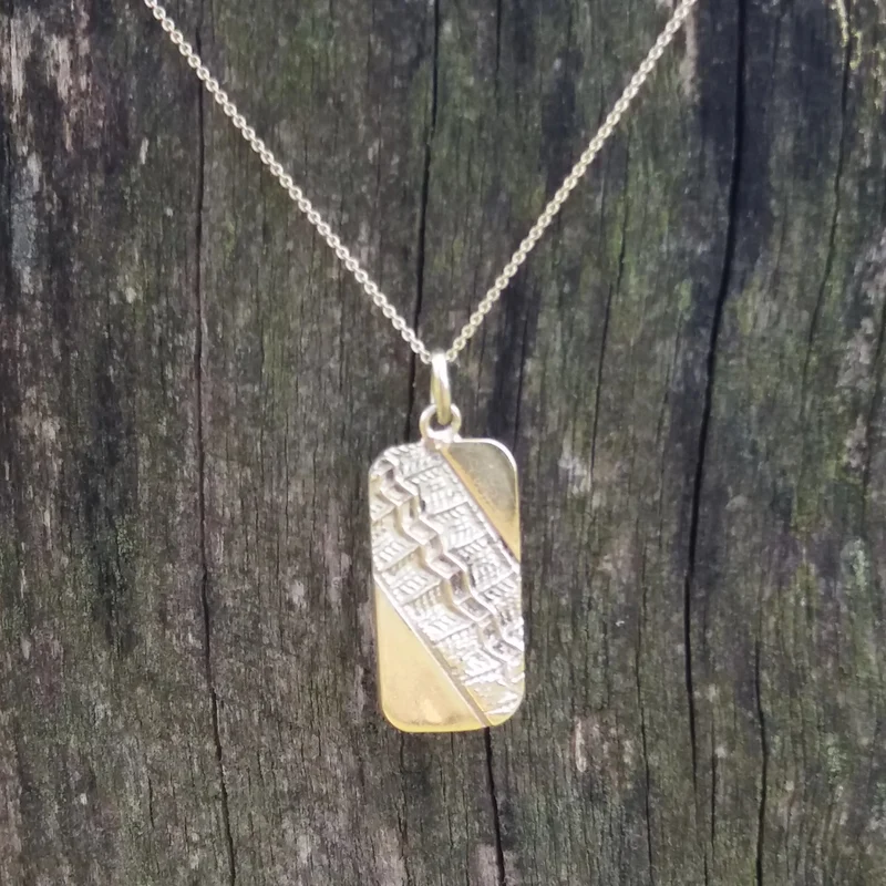 Tire imprint pendant