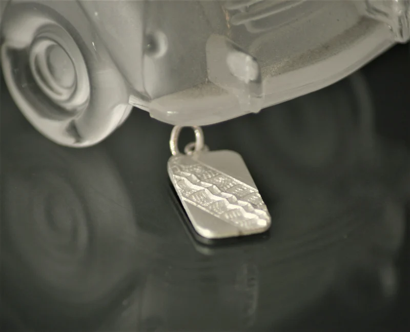 Tire imprint pendant
