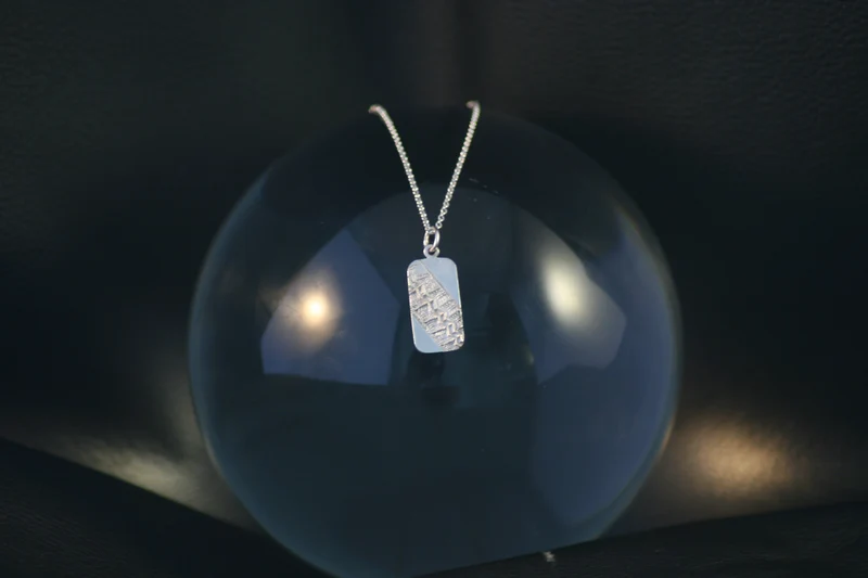 Tire imprint pendant