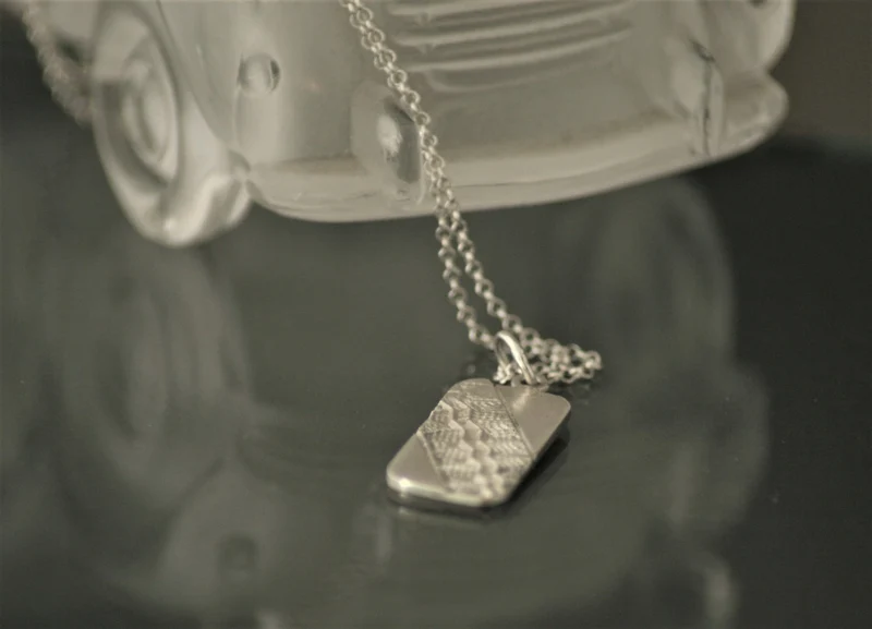 Tire imprint pendant