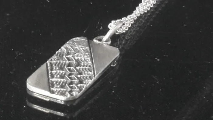 Tire imprint pendant
