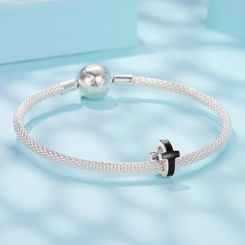 Beautiful Black Cross Spacer | EN