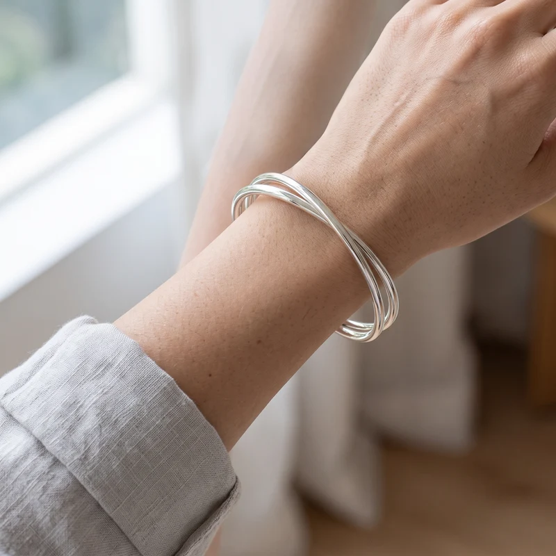 Solid Silver Open Cross Over Band Bangle