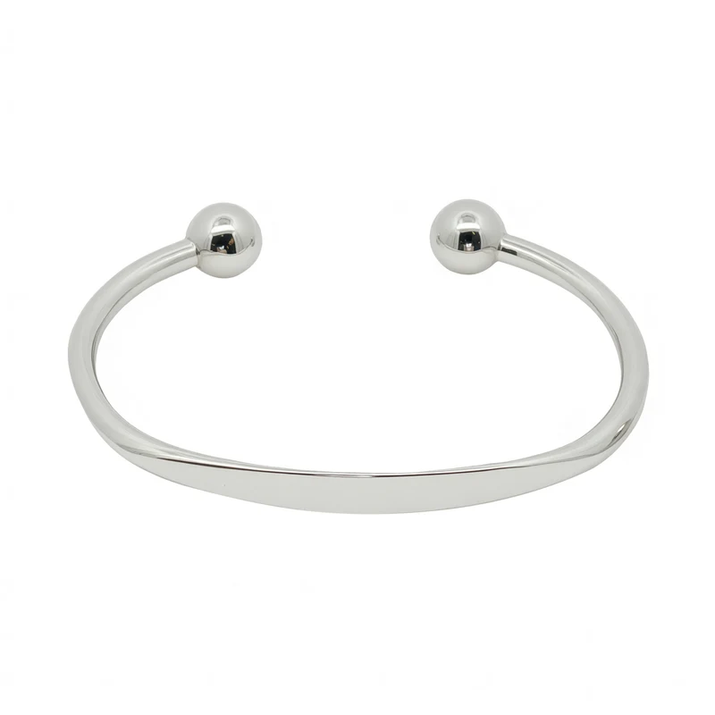 Solid Silver Faceted Torque Bangle