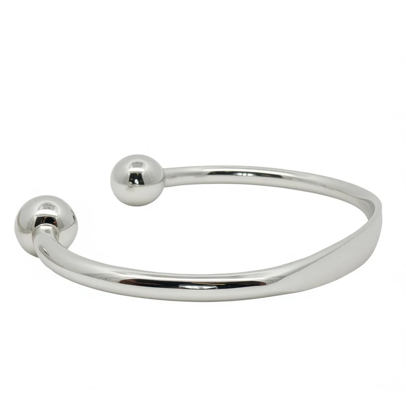 Solid Silver Faceted Torque Bangle