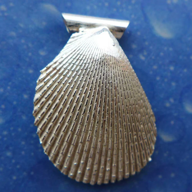Muschelschmuck Anhänger Feile