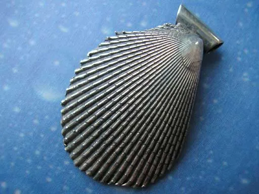 Muschelschmuck Anhänger Feile