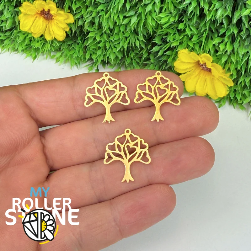 Anhänger aus Silber und Gold mit Lebensbaum und Herz
