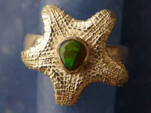 Kissenstern mit Opal Ring