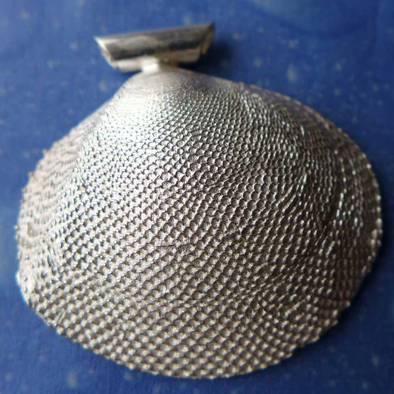 Inselschmuck Tellmuschel Anhänger Raspel