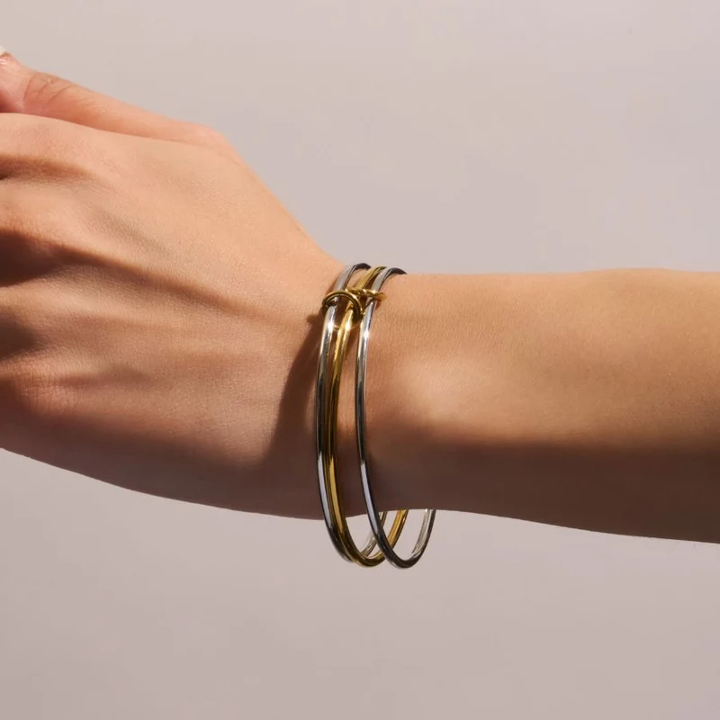 Bi-Color Infinity Armreif 18K Vergoldet