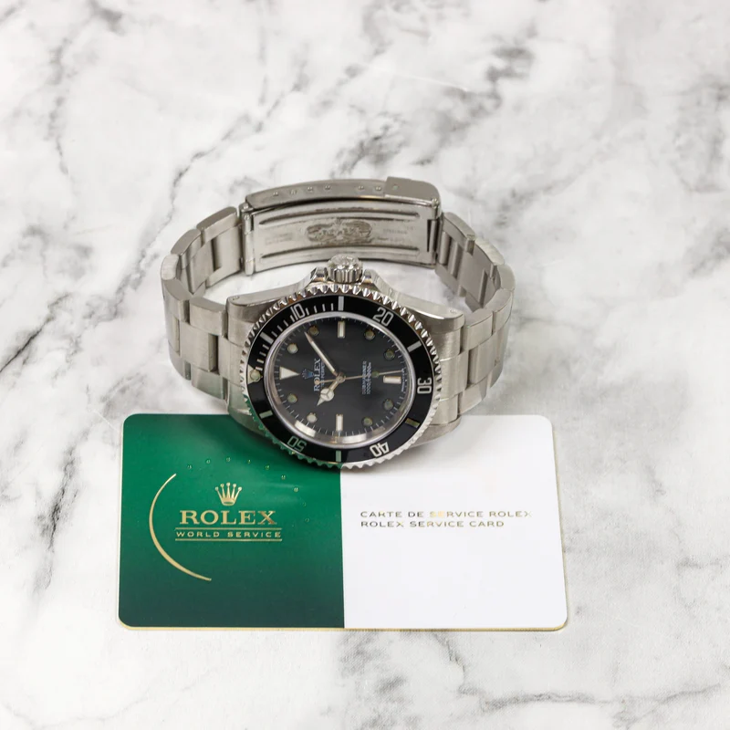 Rolex Submariner 40 14060 No Date Edelstahl Service card 03/24