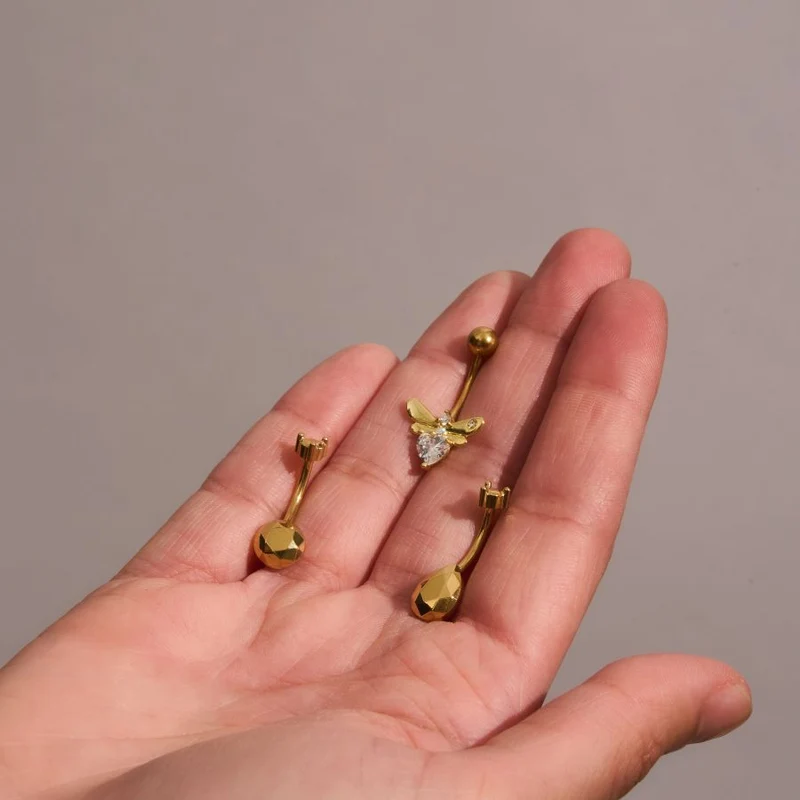 Golden Sphinx Moth Belly Piercing