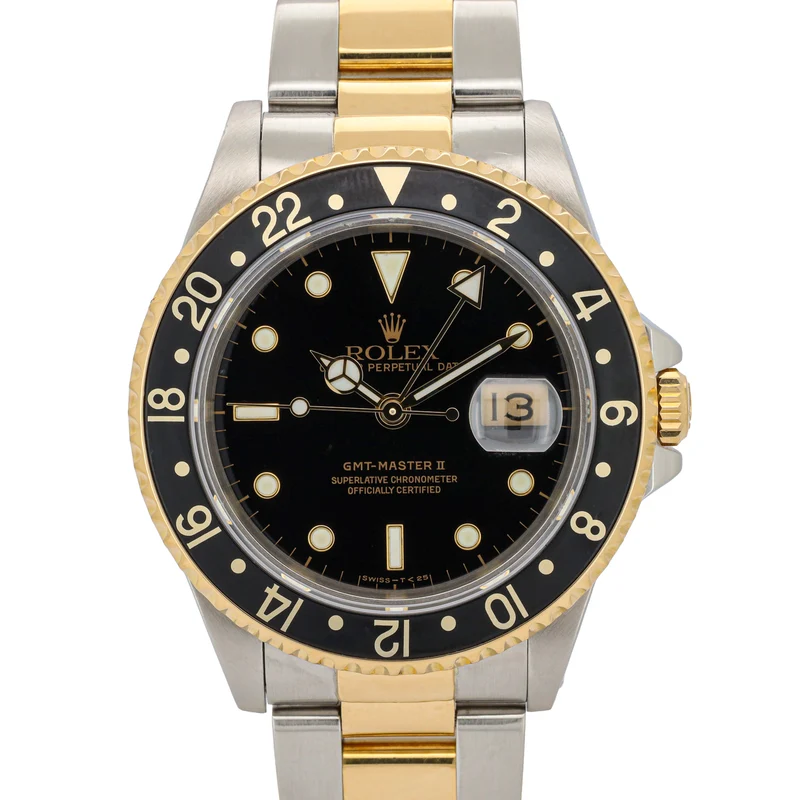 Rolex GMT-Master II 16713 Stahl/Gold Black Dial Sn. L...