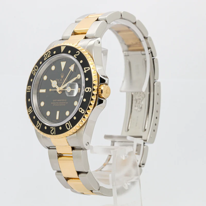 Rolex GMT-Master II 16713 Stahl/Gold Black Dial Sn. L...