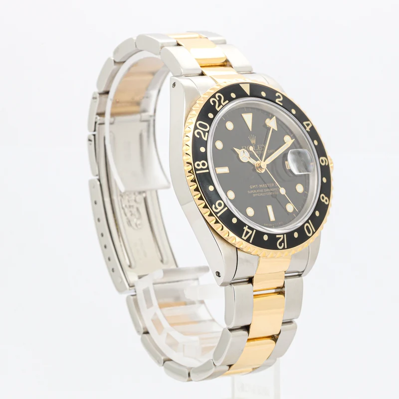 Rolex GMT-Master II 16713 Stahl/Gold Black Dial Sn. L...
