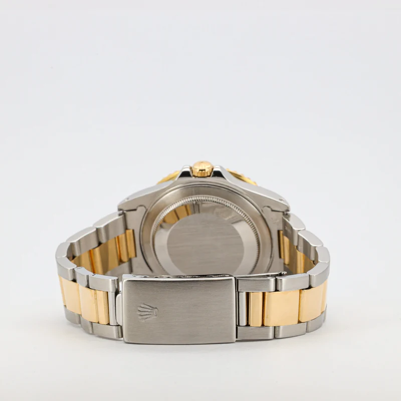 Rolex GMT-Master II 16713 Stahl/Gold Black Dial Sn. L...