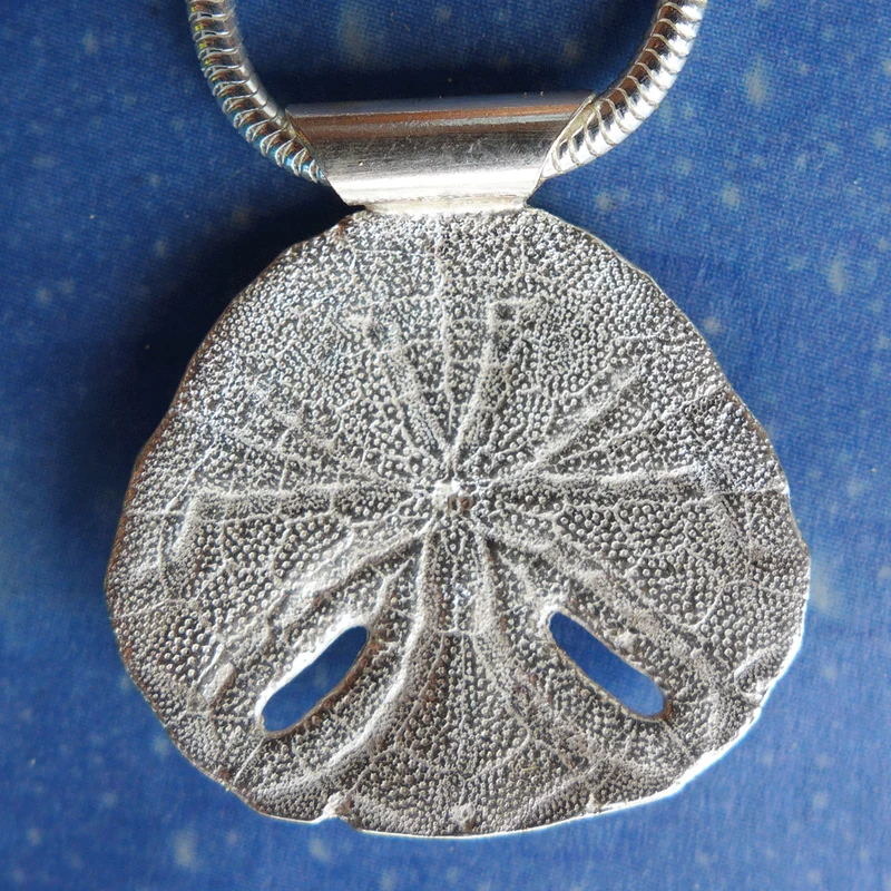 Seeigel Sanddollar Schmuck Madagascar
