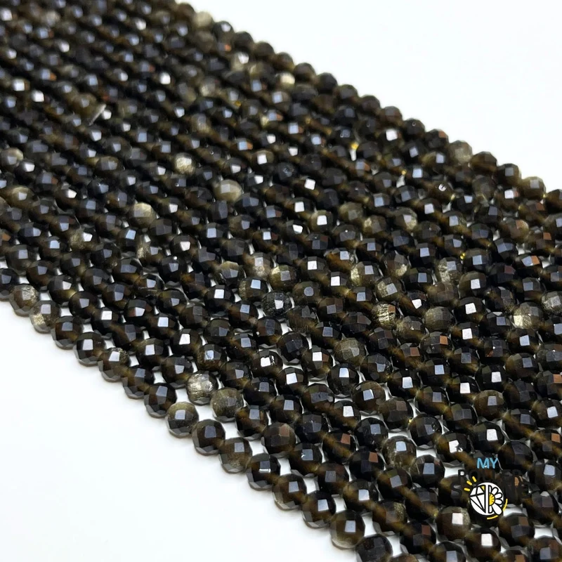 Facettierte goldene Obsidianperle