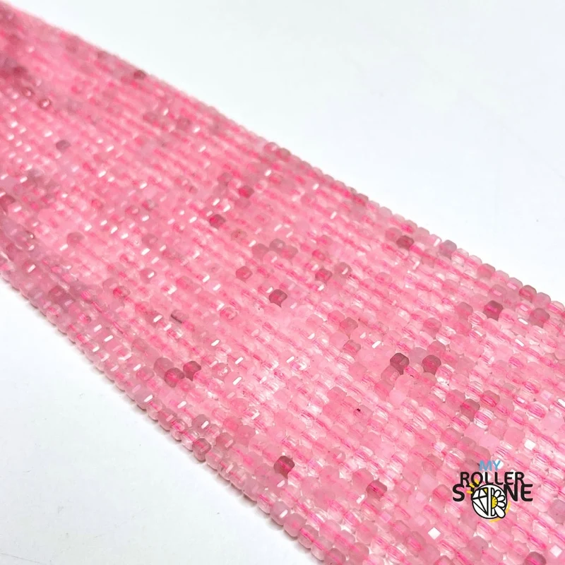 Facettierte kubische Rosenquarzperle