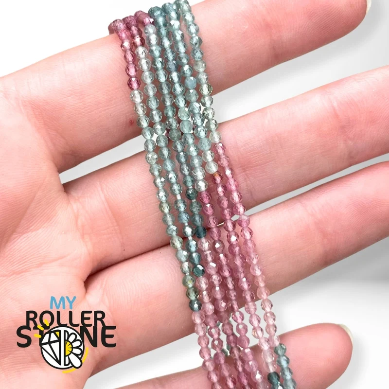 Facettierte runde Perlen rosa und blauer Turmalin 5A
