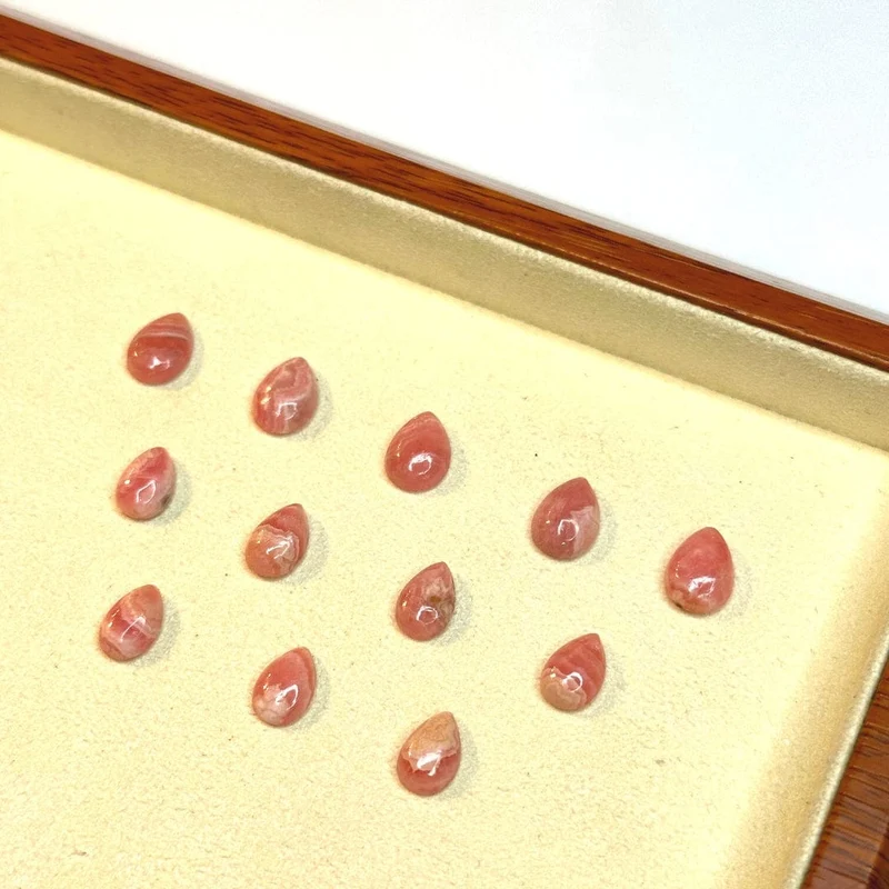 Rhodochrosit-Tropfen-Cabochon (Klasse A)