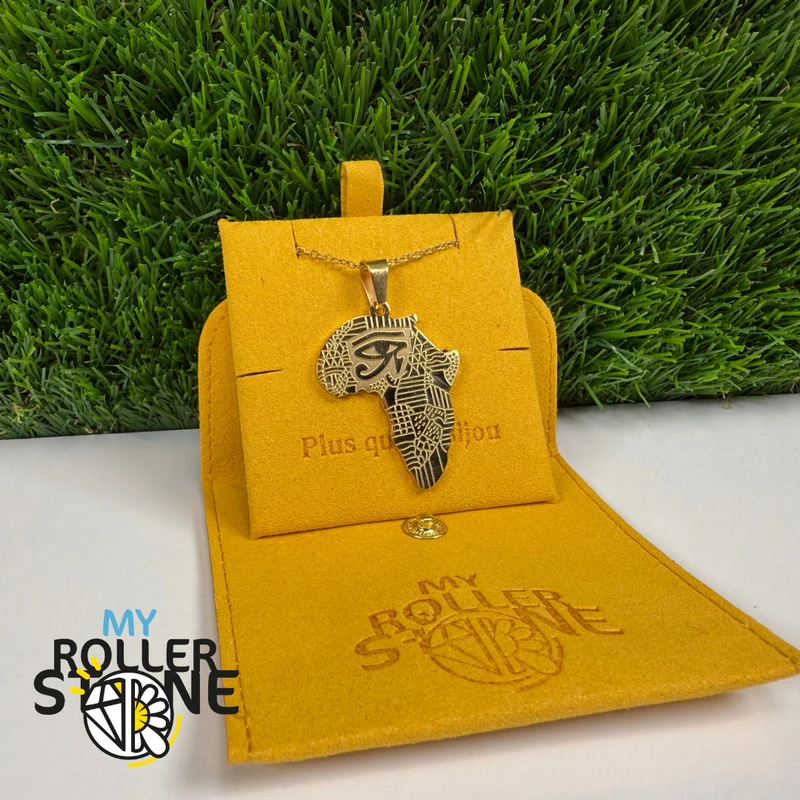 Goldener Anhänger mit Afrika- und Horusauge-Motiv