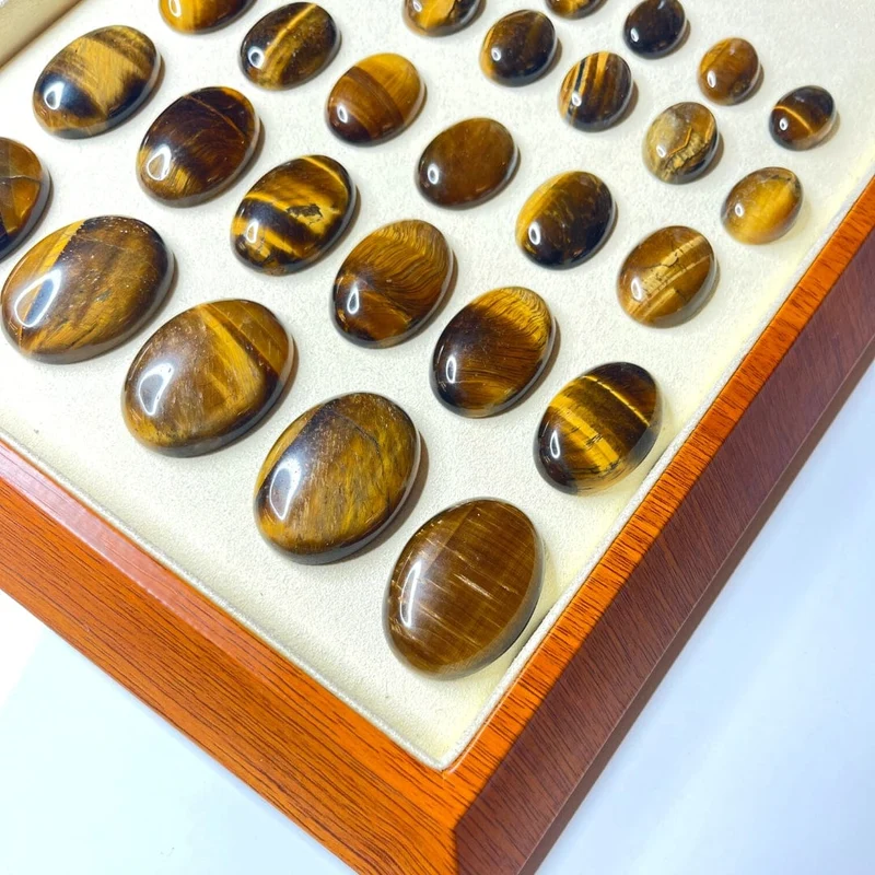 Ovaler Tigerauge-Cabochon
