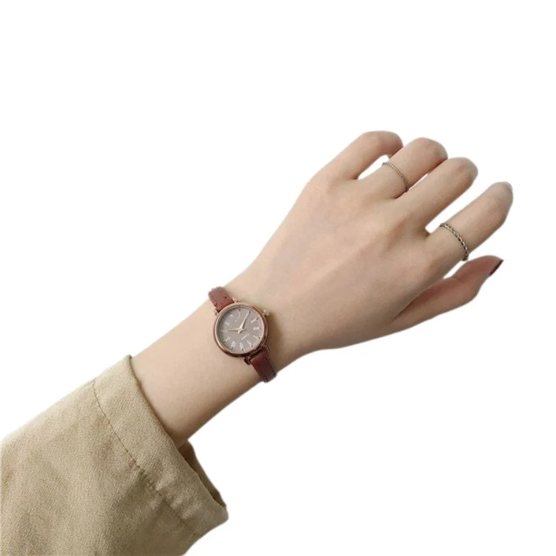 Vintage-Armbanduhr aus braunem Leder für Damen