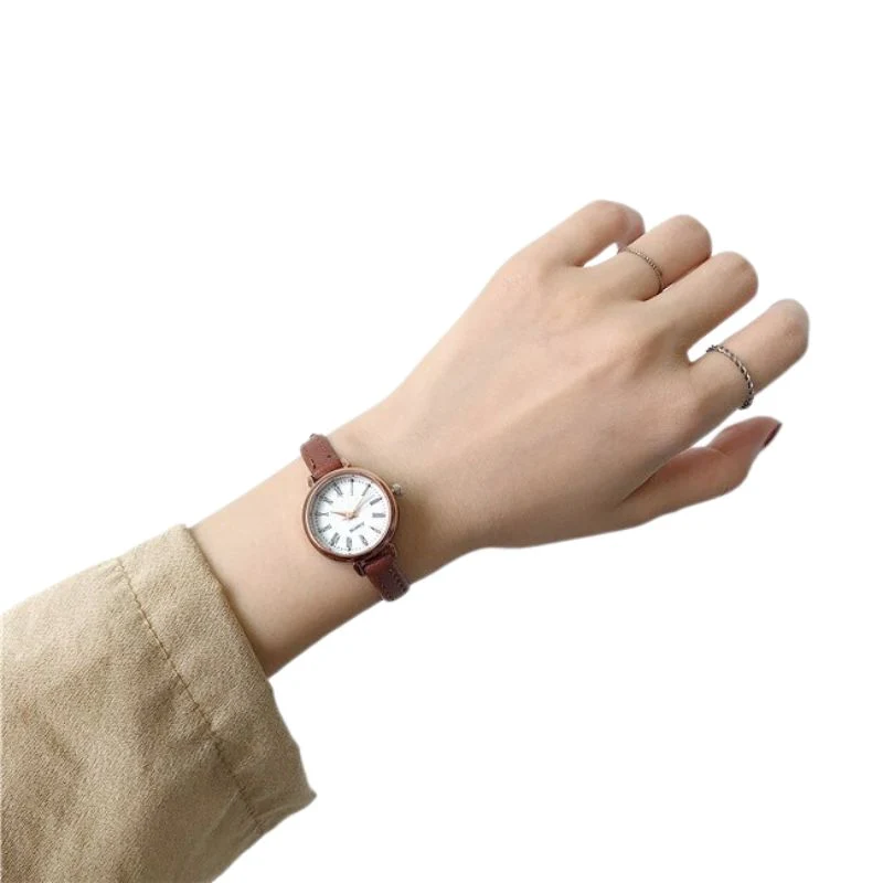 Vintage-Armbanduhr aus braunem Leder für Damen